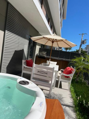 lindo loft in jurerê bem pertinho mar